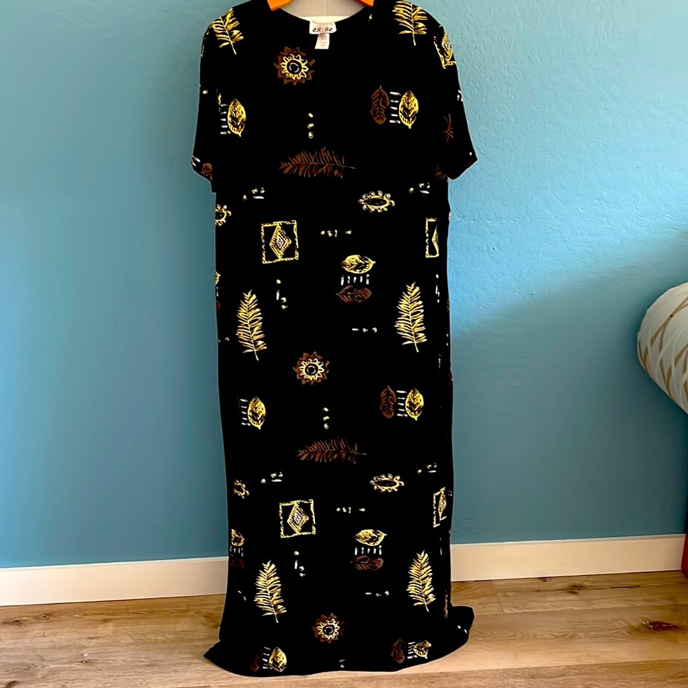 Elegant, soft long dress. Dress with a long necklace.